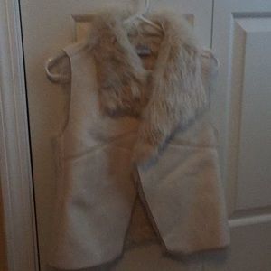 Jennifer Lopez fur lined vest.